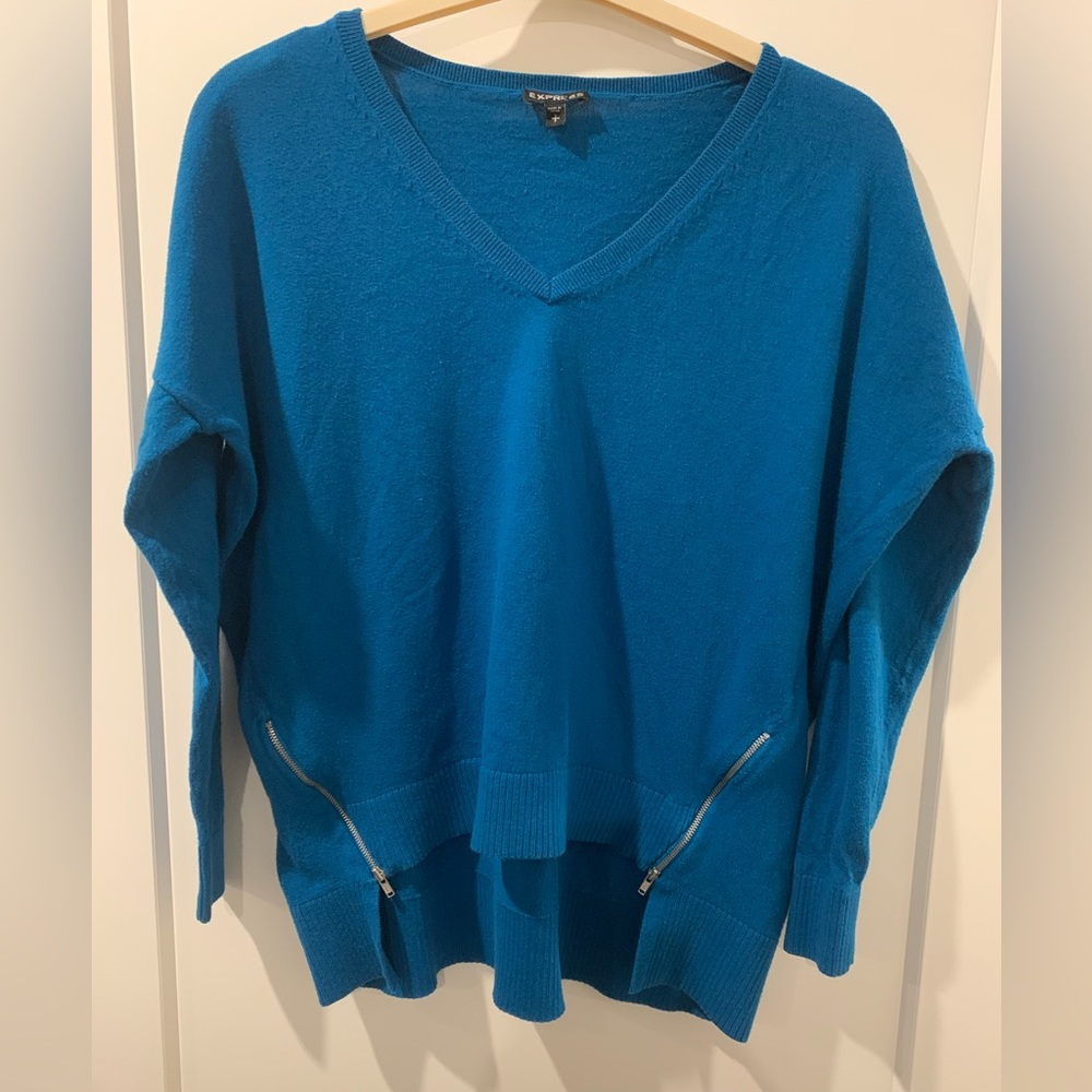 Blue v neck zipper bottom sweater. Size small.